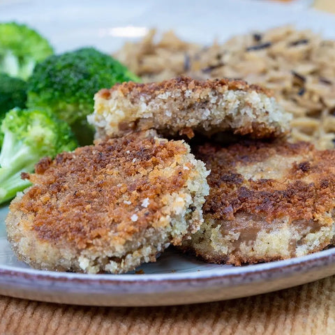Loma Linda Choplets served with vegetables and breading, plant-based vegetarian protein patties.
