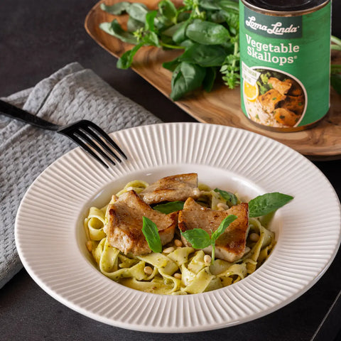 Vegetable Skallops served with pesto spaghetti - vegan scallop alternative plated with pasta