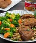 Loma Linda Frichik Original served with a broccoli and carrots medley, and rice.