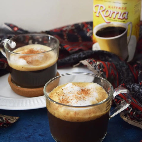 Kaffree Roma served in glass mugs with a frothy milk top, highlighting a creamy, caffeine-free coffee alternative.