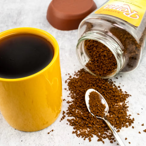 Kaffree Roma served in a mug with a cozy setting, showcasing a caffeine-free coffee alternative.