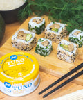 Loma Linda Lemon Pepper TUNO served in sushi rolls with chopsticks, vegan tuna alternative.