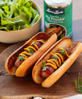 Two Low Fat Big Franks on grilled buns with mustard, ketchup, and parsley garnish – plant-based hot dog alternative served classic cookout style