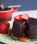 Chocolate cake topped with strawberries made using neat Egg, vegan egg replacement for baking.