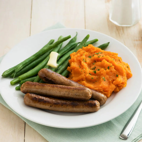 Saucettes served with green beans and mashed sweet potatoes for dinner