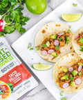 Taco Filling served with tortillas, avocado, and radish's