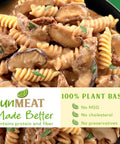 Plant-based beef stroganoff pasta dish with mushrooms and greens in a creamy sauce, labeled 'unMEAT Made Better'.