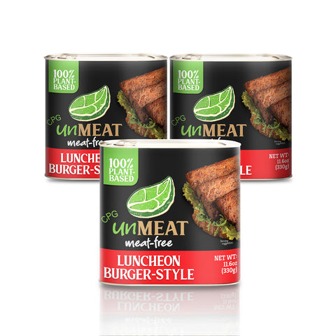 Three cans of UnMeat Luncheon Burger-Style on a white background