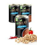 Three cans of 'unMEAT' plant-based no beans chili with ingredients on a white background