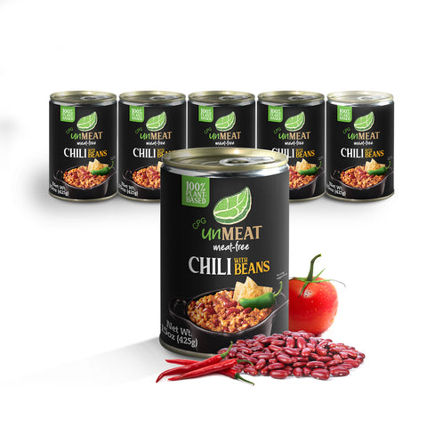 Six cans of 'UnMEAT' meat-free chili with beans on a white background