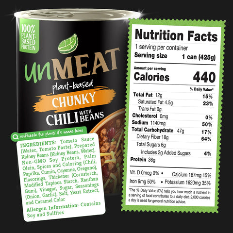 Can of 'UnMEAT' plant-based chunky chili with nutrition facts label and ingredients list on a black background