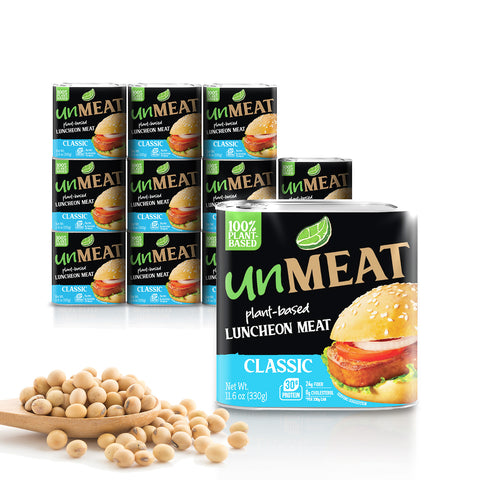 Twelve UnMeat plant-based classic luncheon meat packaging with soybeans on a white background