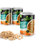 Three cans of 'unMEAT' country beef vegetables soup with a wooden spoonful of beans on a white background.