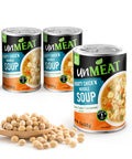 Three cans of 'unMEAT' Hearty Chicken Noodle Soup with a wooden spoonful of beans on a white background.