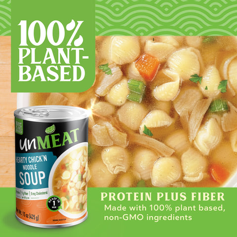 UnMeat hearty chicken noodle soup can with plant-based soup in the background on a green background
