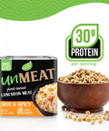 Can of 'UnMeat' plant-based luncheon meat hot and spicy flavor with a bowl of beans and protein information on a white background.