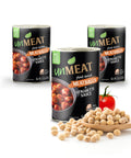 Three cans of 'UmMeat' plant-based meatballs in spaghetti sauce with a wooden spoonful of beans and a tomato on a white background.