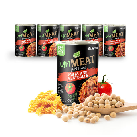 Six cans of 'UnMeat' pasta and meatballs with ingredients on a white background