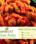 UnMeat pasta with meatballs in a red sauce on a plate, featuring product health benefits.