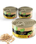 Three cans of Umeat fish-free tuna style flakes in sunflower oil on a white background